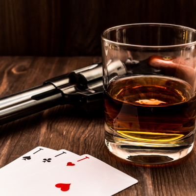 whisky-and-gun-on-table.jpg image 1